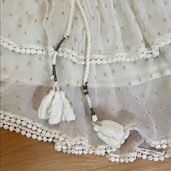 Elegant Cream Skirt with Tassel Detail - Picture 4 of 7